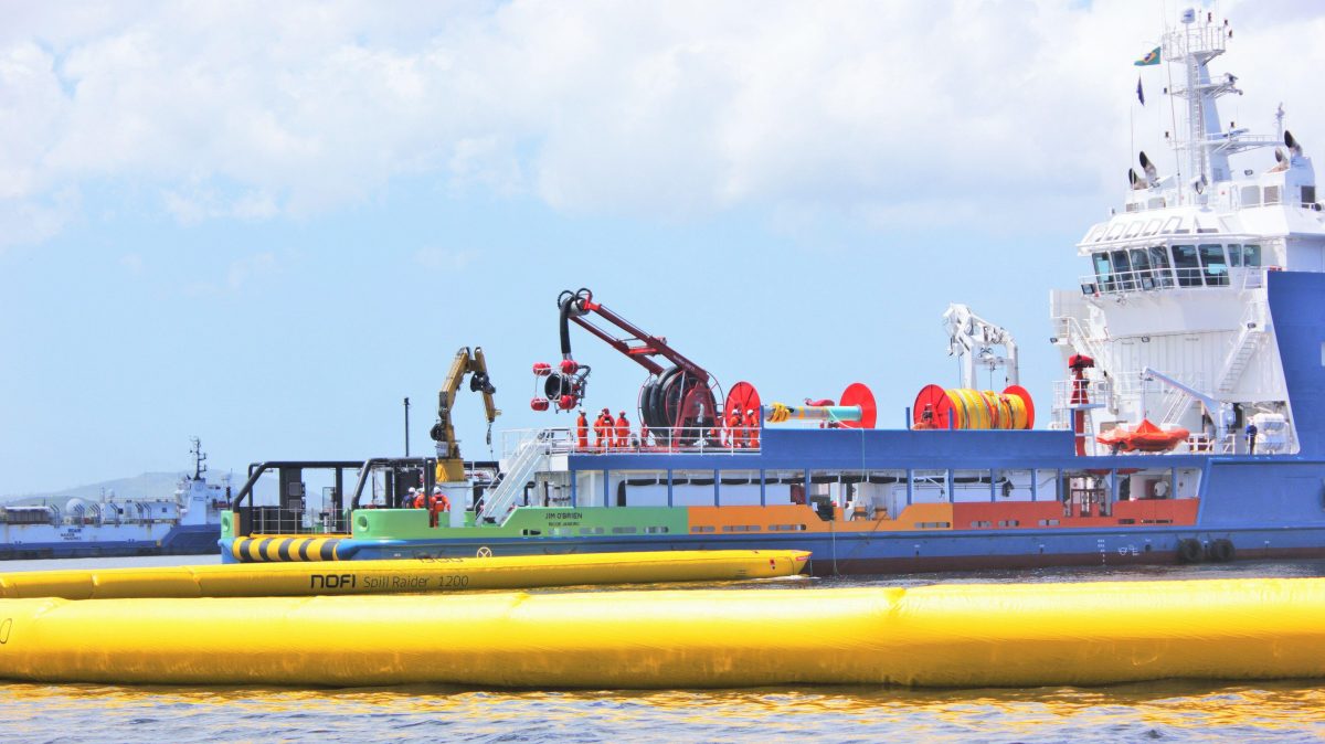 NOFI SpillRaider Automatic Inflatable Oil Containment Boom deployed off an Offshore Vessel